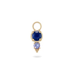 sapphire and tanzanite gold earring charm on white background