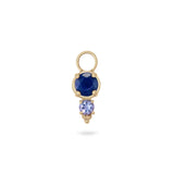 sapphire and tanzanite gold earring charm on white background
