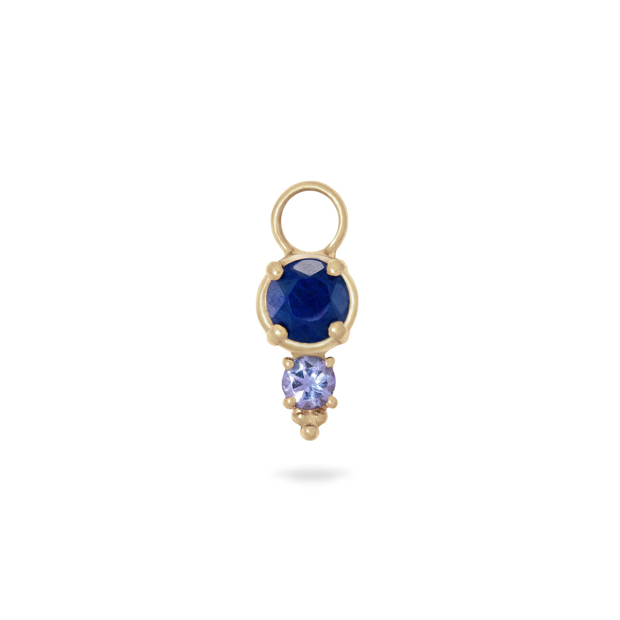 sapphire and tanzanite gold earring charm on white background