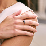 Sapphire ring on models hand