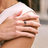 Sapphire ring on models hand