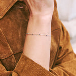 sapphire silver bracelet on models wrist