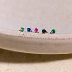 flat back earring layed on bowl