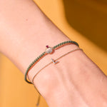 Gold bracelets on model