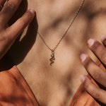 model wearing the Snake Pendant 9k Gold