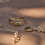 Snake Ring 9k Gold on hard surface