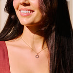 model wearing the Sunburst Silhouette Necklace 9k Gold
