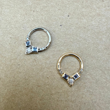 close up of the Tanzanite & Diamond Daith Hoop Earring 9k White Gold and Tanzanite & Diamond Daith Hoop Earring 9k White Gold
