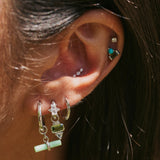 close up of model wearing the Turquoise & Green Tourmaline Baguette Flat Back Earring 14k White Gold