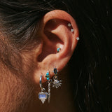 model wearing silver jewellery including the White Sapphire Drop Spike Earring Charm Sterling Silver