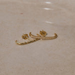 White Sapphire Pave Suspender Earring 14k Gold Vermeil on porcelain dish along with the hammered suspender earring