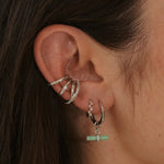 close up of ear stack in silver including the White Sapphire Star Ear Cuff Sterling Silver