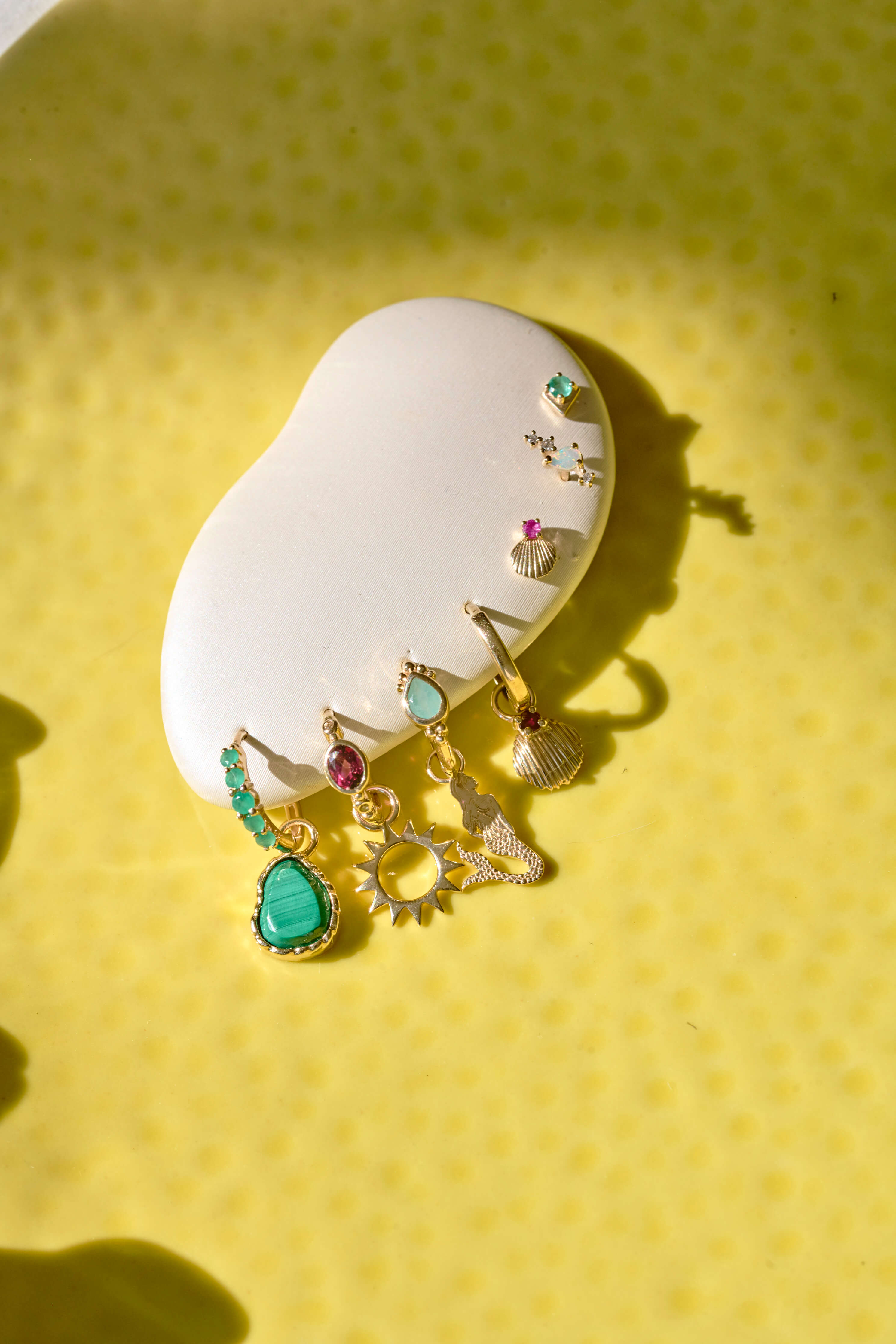 <p><small>New solid gold earrings</small></p>sunshine stacked