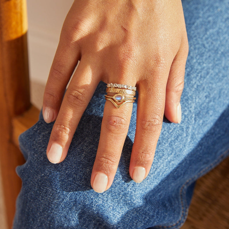 solid gold ring stack including the Moonstone & Diamond Tear Drop Ring 9k Gold