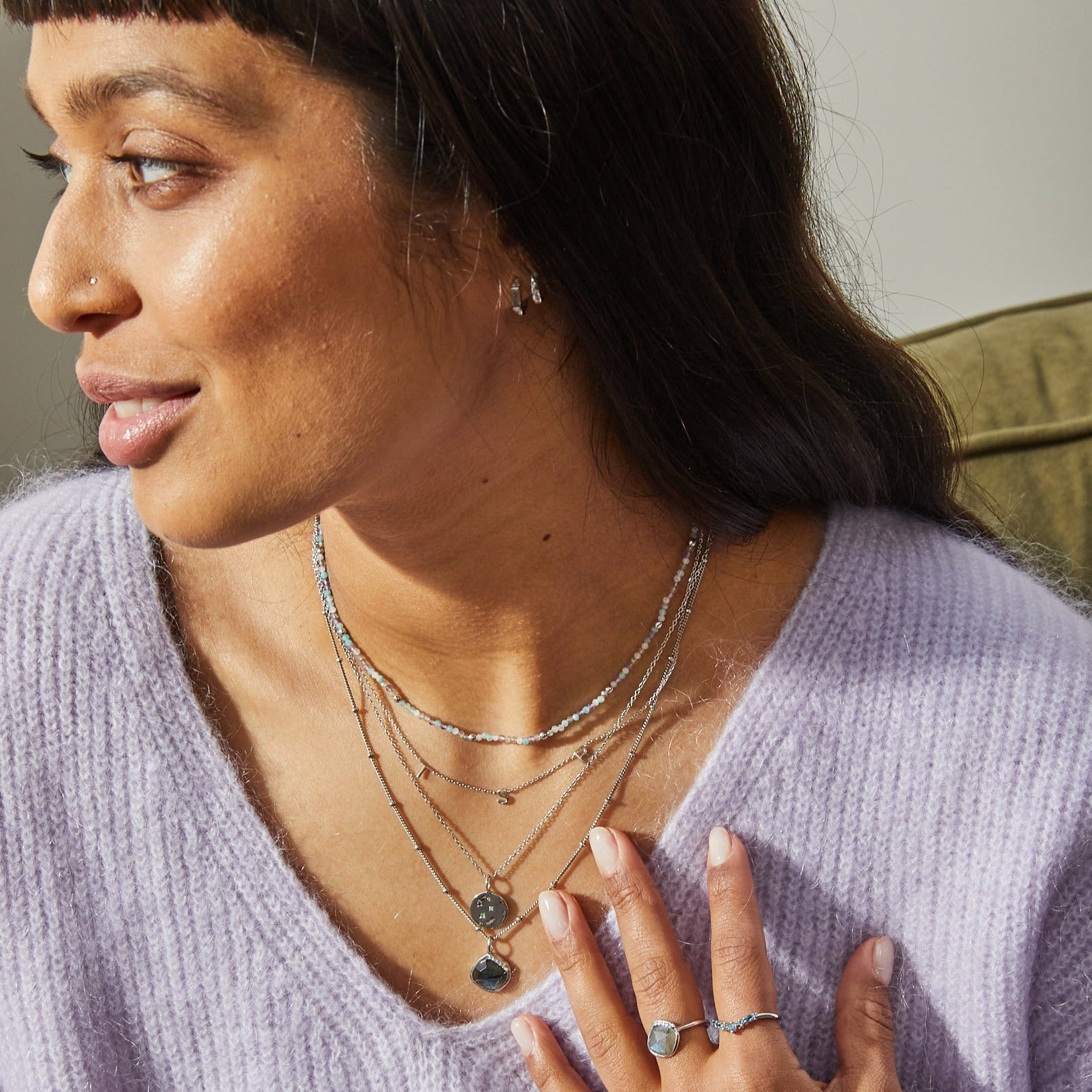 model wearing silver jewellery including the Grecian Labradorite Stone Pendant Sterling Silver