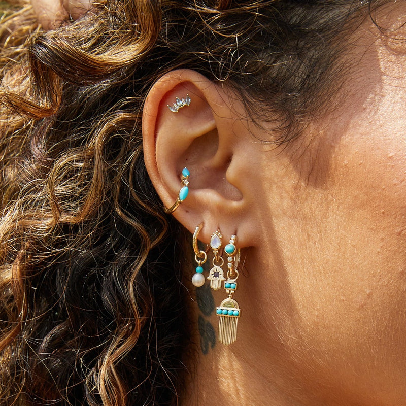 solid gold earring stack including the Aztec Turquoise Earring Charm 9k Gold