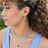 model wearing sterling silver pieces including the Pearl & Turquoise Earring Charm Sterling Silver