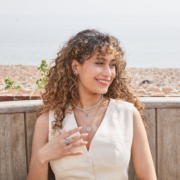 model wearing beautiful sterling silver jewellery including the Copper Turquoise & Moonstone Necklace Sterling Silver