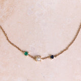 Personalised Birthstone Trio Bracelet 9k Gold on hard surface