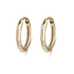 pair of gold hoops white background