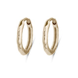 pair of gold hoops white background