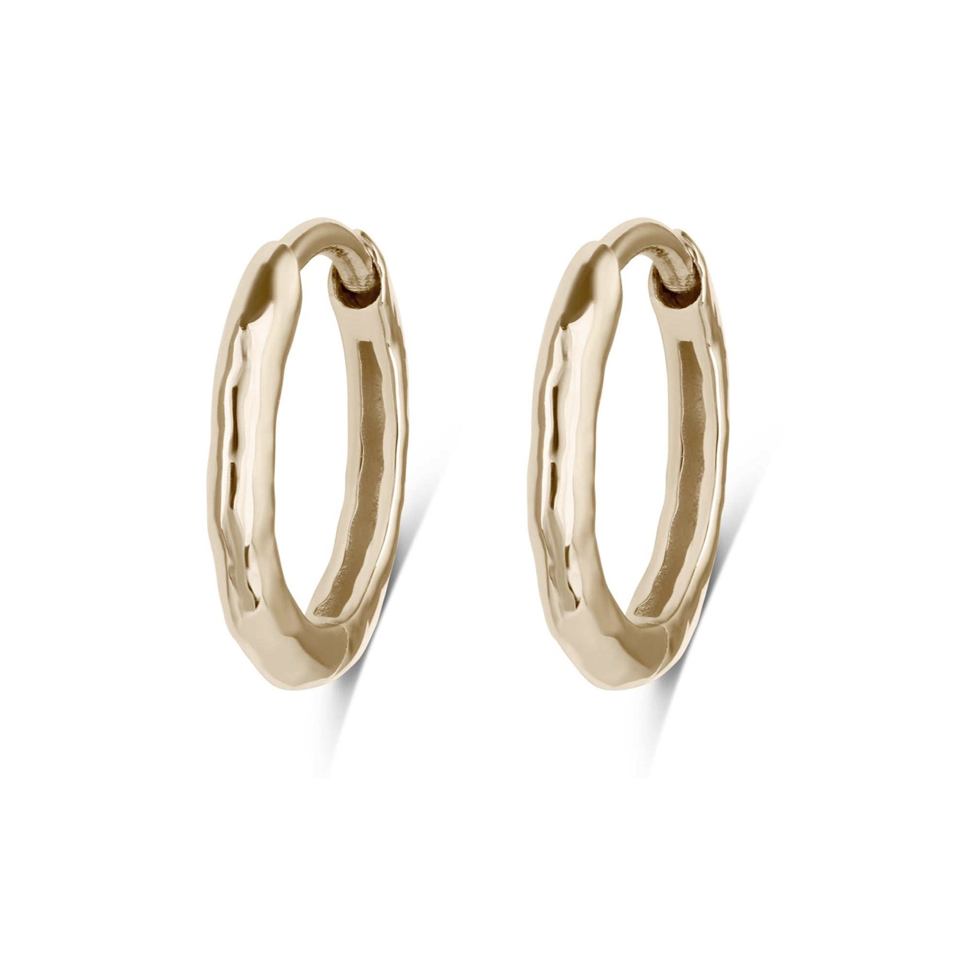 pair of gold hoops white background
