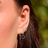 silver charms on ear